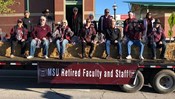 Retired Faculty Staff Event: Ride Homecoming Parade Float